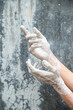 © Malquerida Studio/Stocksy - Close up of ceramist's hands dirty of clay