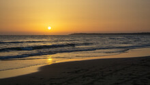 Cadiz Beach At Sunset In The Golden Hour