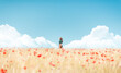 © Ibai Acevedo/Stocksy - Girl between clouds at sunny spring day