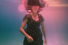 Underwater Girl Walking Towards Camera