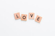 © gitusik - Wooden blocks in a pastel board with the text end heart.