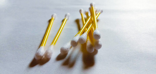 Canvas Print - High angle shot of some sanitary Q-tips on a white surface