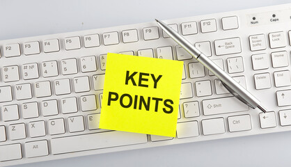 Poster - text KEY POINTS on the keyboard on the white background