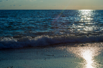 Wall Mural - Amazing sea sunset, the sun, waves, clouds