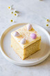 © Nadine Greeff/Stocksy - Cake slice with easter eggs