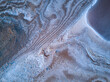 © INIGO CIA DA RIVA/Stocksy - Colorful abstract background of pink salt lake