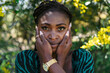 © Lucas Ottone/Stocksy - Black woman with natural beauty