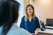 © VICTOR TORRES/Stocksy - Female doctor attending a patient in her medical office