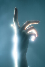 Glowing Hand Of Anonymous Woman