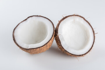 Broken dry coconut isolated on white background.