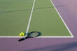 © Bisual Studio/Stocksy - Tennis racket and ball on a colorful court