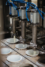 Filling Yogurt In A Dairy Factory