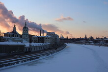 View Of The Kremlin And The Moscow Frozen River During A Winter Sunset