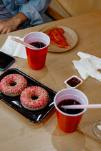 Sweet Drinks And Donuts On Cafe Table