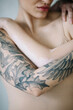 © Jovana Rikalo/Stocksy - Portrait of a young tattooed woman and woman with vitiligo