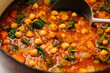 © Cameron Whitman/Stocksy - Chickpea stew closeup