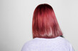 © Ángela Rober/Stocksy - Back view of a woman with red hair