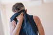 © Javier Pardina/Stocksy - Handsome Athletic Man Wiping his Head