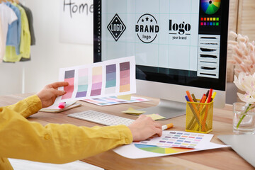 Poster - Female designer working in office