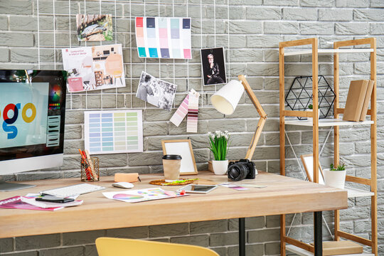 Comfortable workplace of graphic designer in office