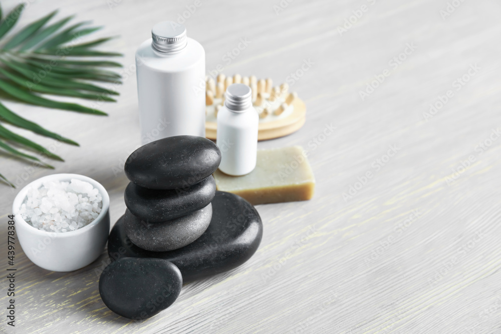 Set of spa supplies on wooden background