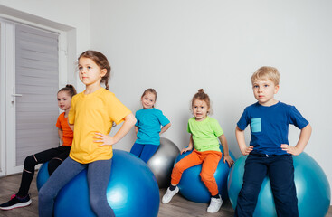 Poster - Engaged kids while physical education lessons at preschool