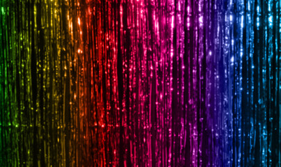 lgbt, decoration and gay symbolic concept - background of foil fringe curtain in rainbow colors