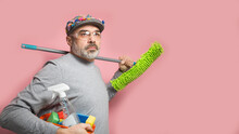 Spring Cleaning Funny Middle Aged Man With A Mop And Wearing Protective Glasses