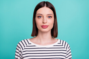 Photo of charming lovely lady calm look camera wear striped shirt isolated on turquoise color background