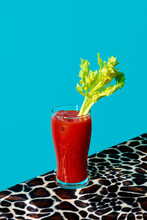 Glass Of Bloody Mary On An Animal Print Fabric