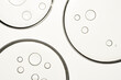 © Martí Sans/Stocksy - Skincare oil emulsion drops abstract design