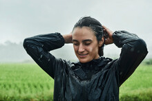 A Young Woman Caught In The Rain