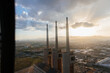 © Marcos Osorio/Stocksy - View from the air of some industrial chimneys