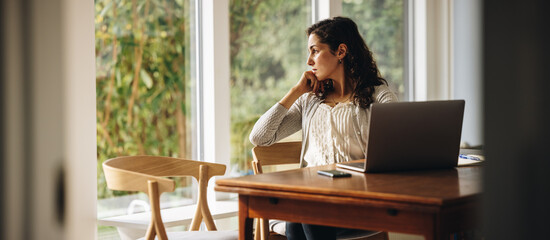 Woman taking a break from work at home