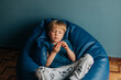 © Olga Moreira/Stocksy - 5 years old kid eating strawberry