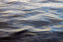 Closeup Of Wavy Deep Waters With The Reflection Of The Sunlight