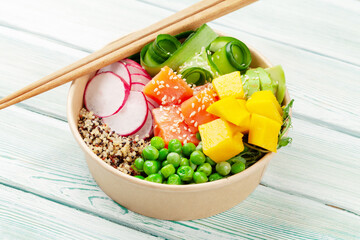 Wall Mural - Poke bowl with salmon, cucumber and mango