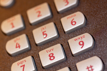 Wall Mural - Selective focus shot of telephone buttons