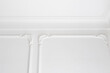 white wall with trim and crown moulding/molding
