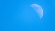 Beautiful crescent moon in the sky, daytime photography