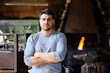© Antonio Ovejero Diaz/Westend61 - Confident male blacksmith standing with arms crossed at workshop