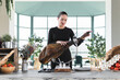 © Josu Acosta/Westend61 - Female chef adjusting meat on ham in restaurant
