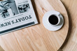 © COROIMAGE/Westend61 - Black coffee with newspaper on wooden table