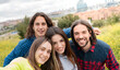 © Jose Carlos Ichiro/Westend61 - Long haired men with female friends in nature