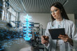 © Infinite Lux/Westend61 - Female engineer with digital tablet examining development of industrial product
