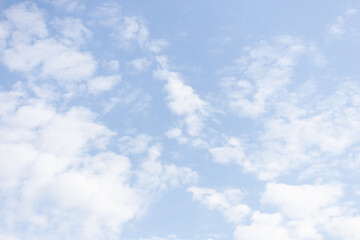 Poster - blue sky with clouds with bright sunlight
