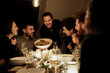 © Malte Jager/Westend61 - Smiling man holding bowl of pasta at dining table