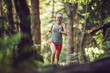 © Mikel Taboada/Westend61 - Excited woman running in forest