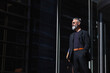 © NOVELLIMAGE/Westend61 - Businessman with hand in pocket looking away in city