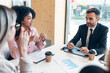 © JOSEP SURIA/Westend61 - Businessman sitting with female professionals at conference table in office